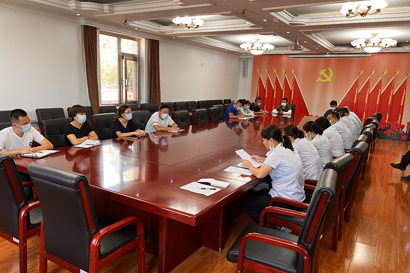强化疫情防控常态化工作会议现场